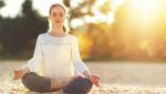 daily-reminder-to-relax-main-image-woman-meditating-expressing-gratitude