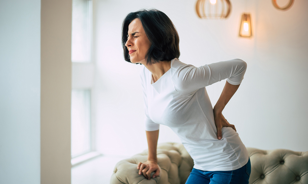 relieve-pain-on-spinal-disk-bulges-woman-with-back-pain